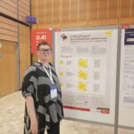 Niamh Walsh presenting her poster at EFIC Conference 2025
