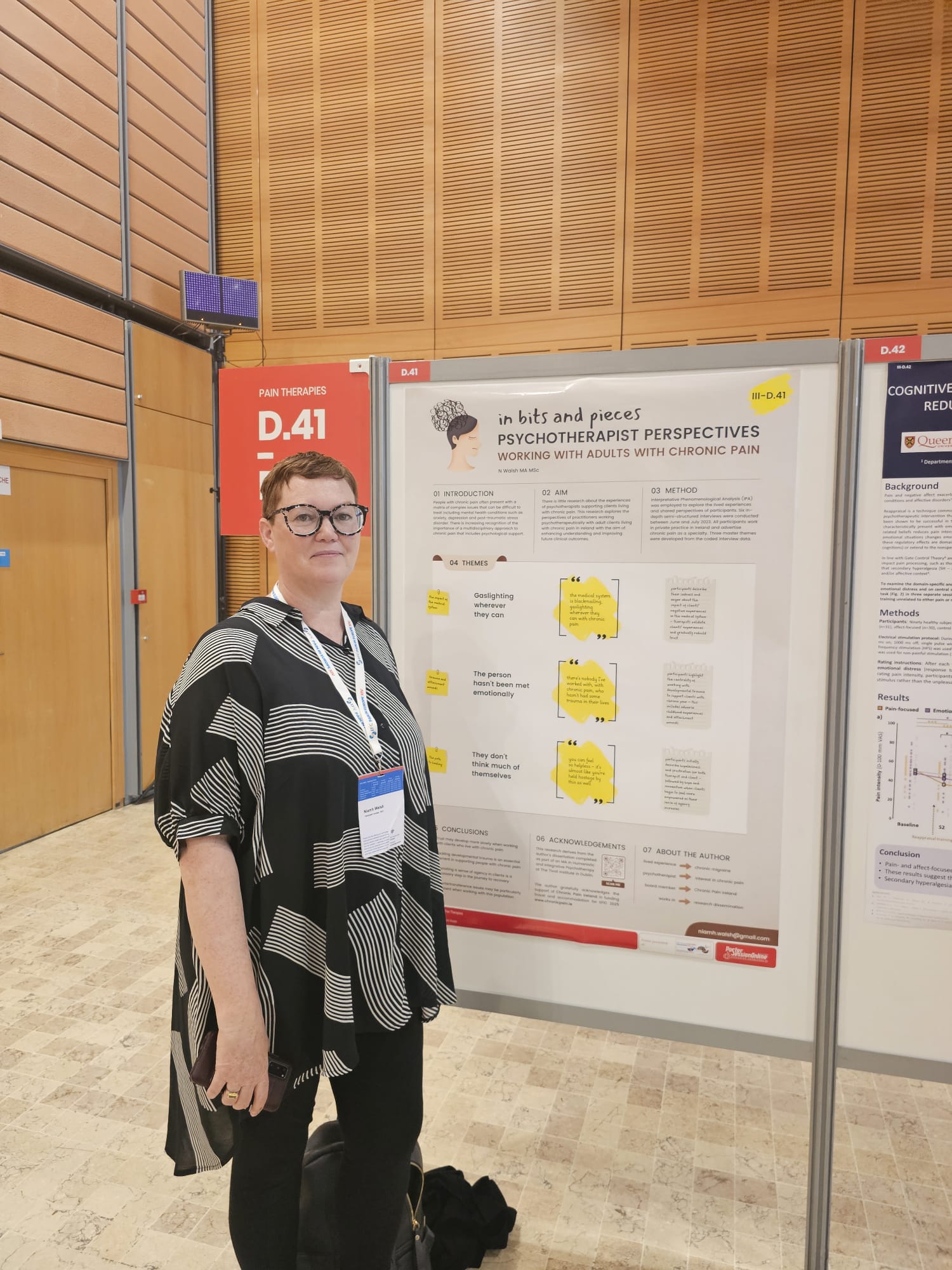 Niamh Walsh presenting her poster at EFIC Conference 2025